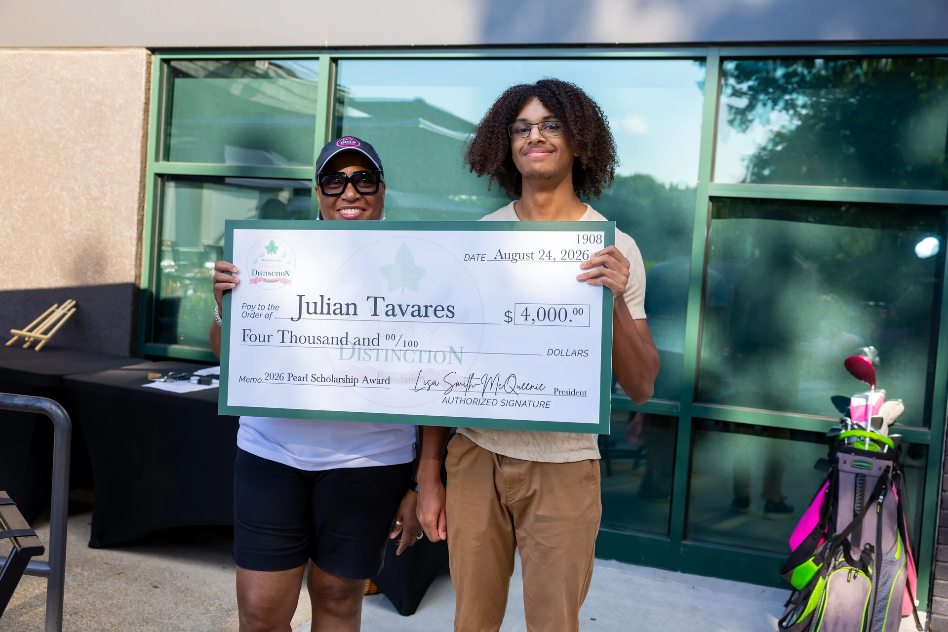 Julian Tavares with his $4,000 Pearl Scholarship award.